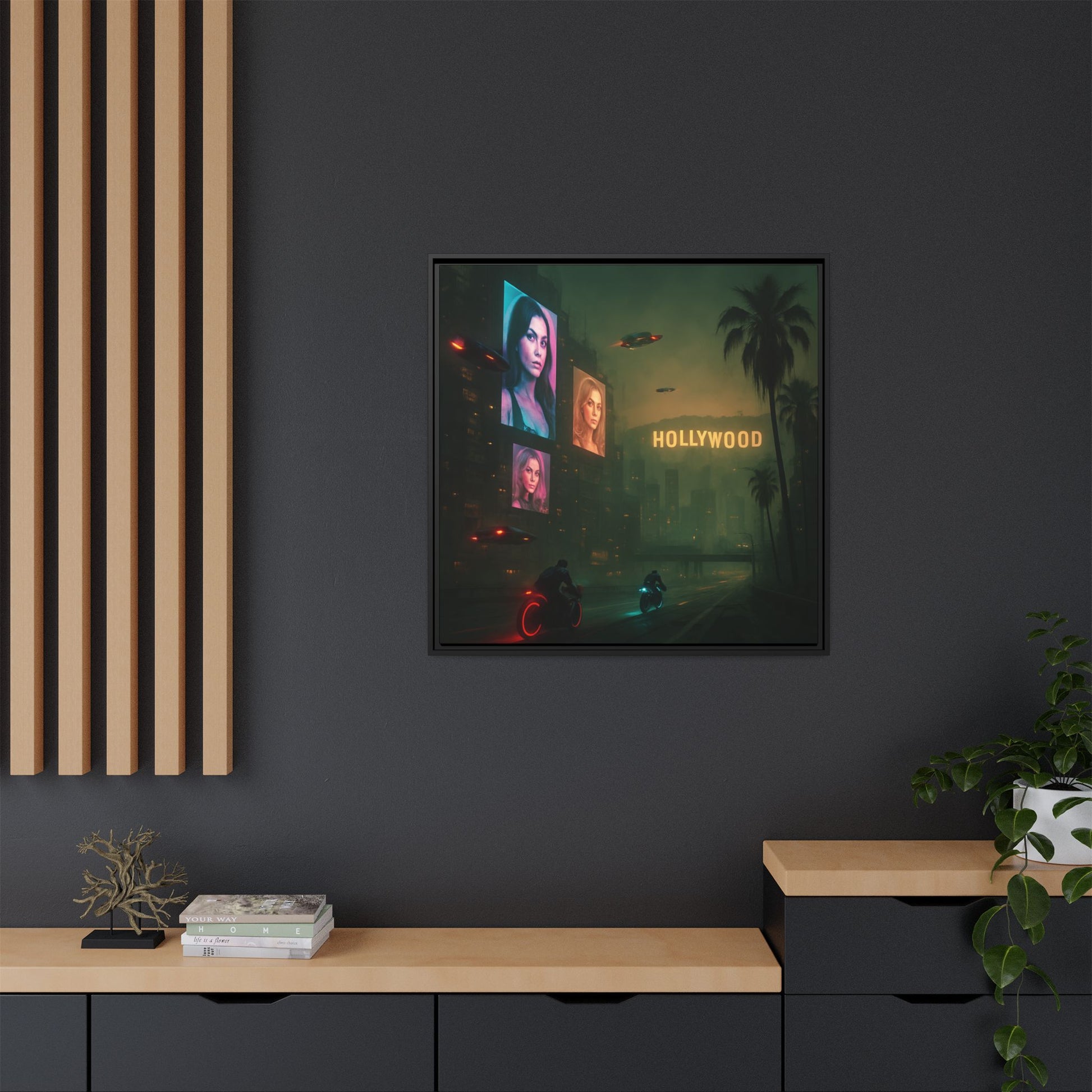Framed artwork of a cityscape with 'Hollywood' sign on a dark wall.