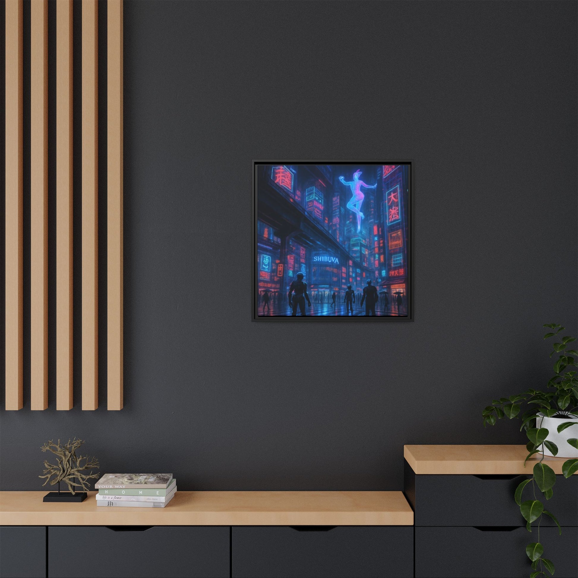 Framed artwork of a futuristic cityscape with neon lights on a dark wall.